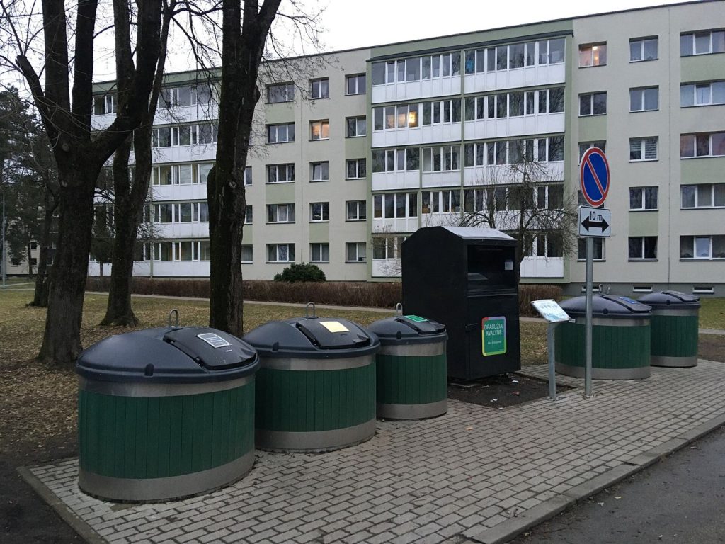 recycling bins lined up on a residential street